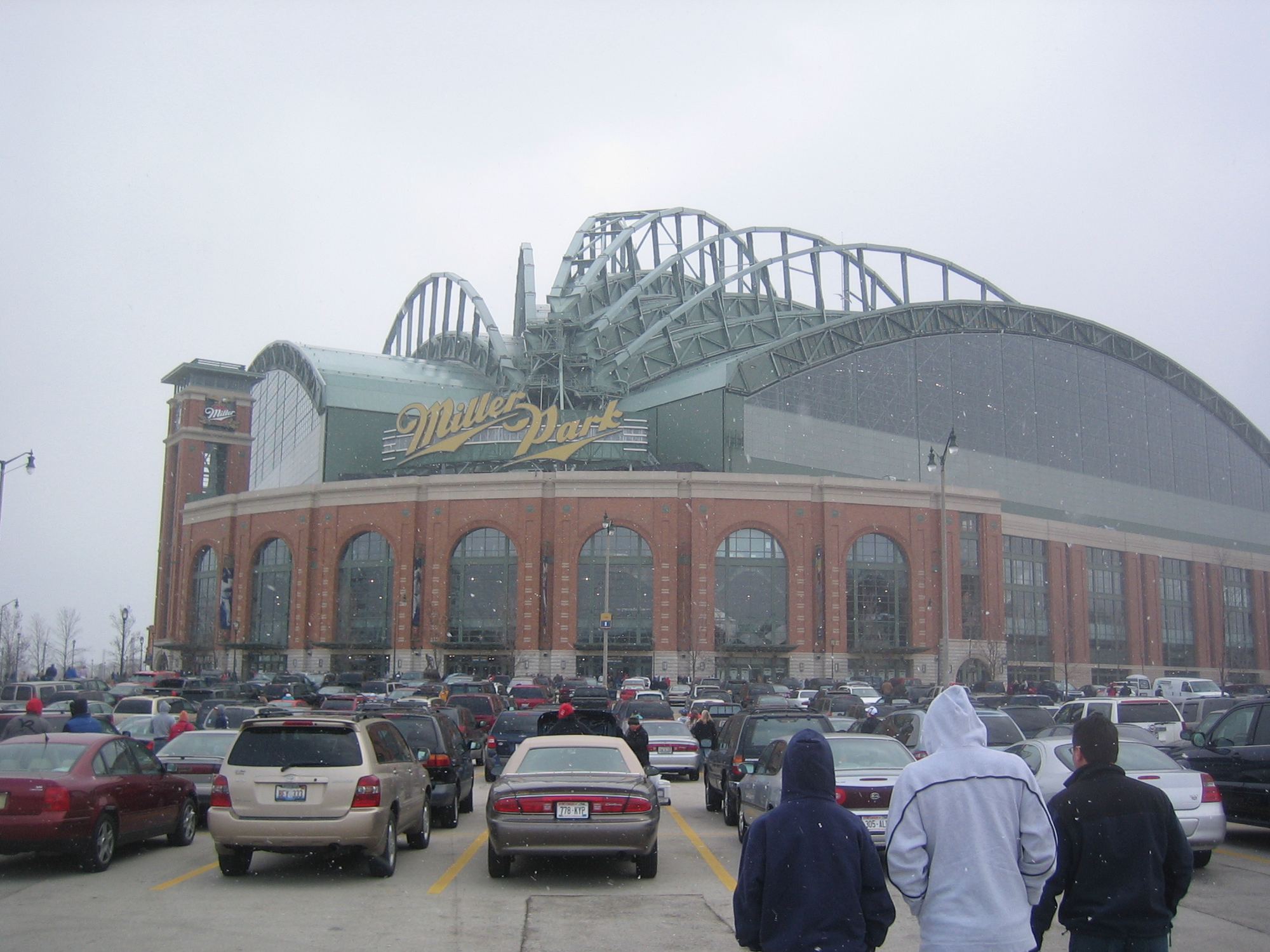 Fans walking to Miller Park through the parking lot