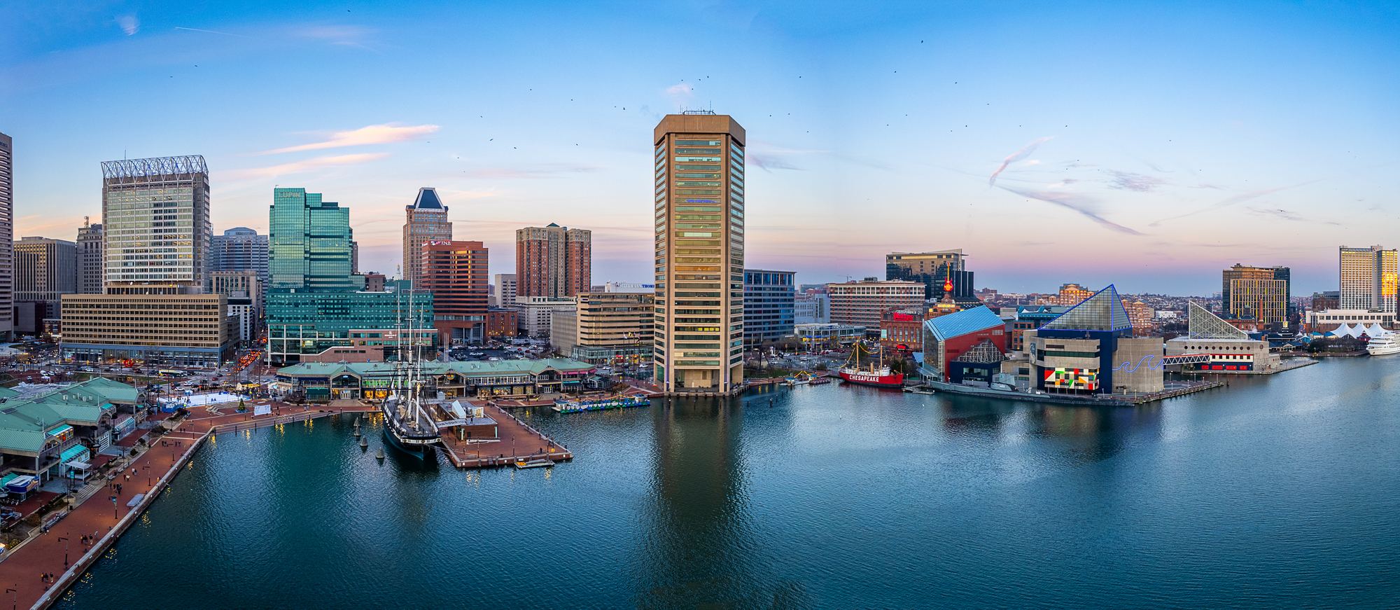 Baltimore's Inner Harbor from the air, with the downtown skyline behind the water