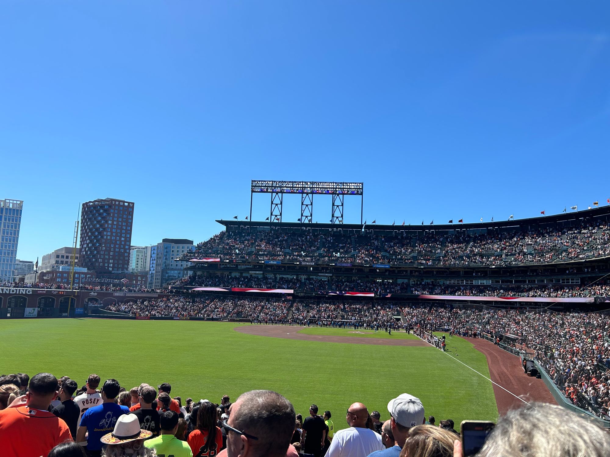 A sunny day game at Oracle Park, seen from the outfield