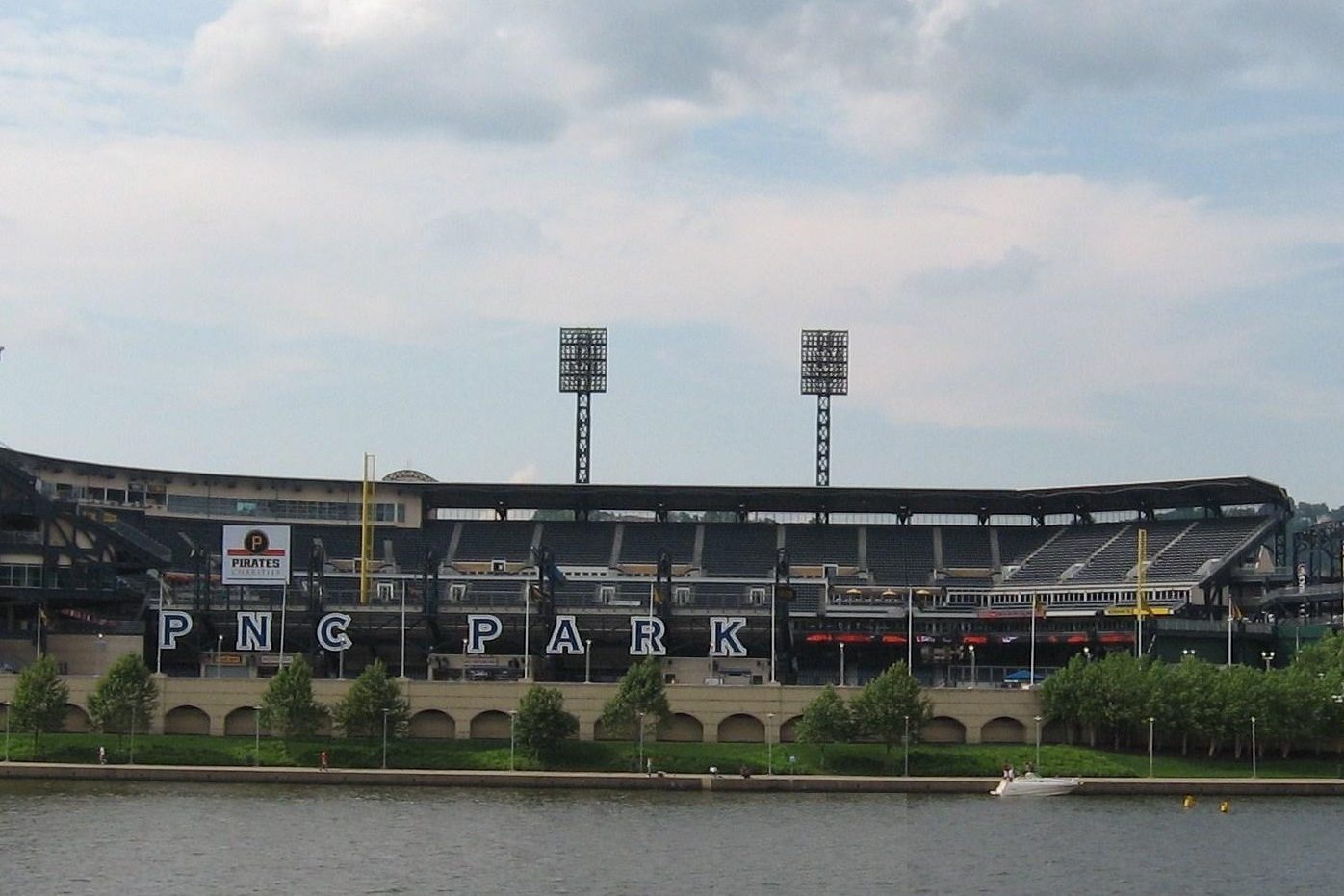 PNC Park seen across the Allegheny River from downtown Pittsburgh, the PNC PARK lettering along the outfield facade