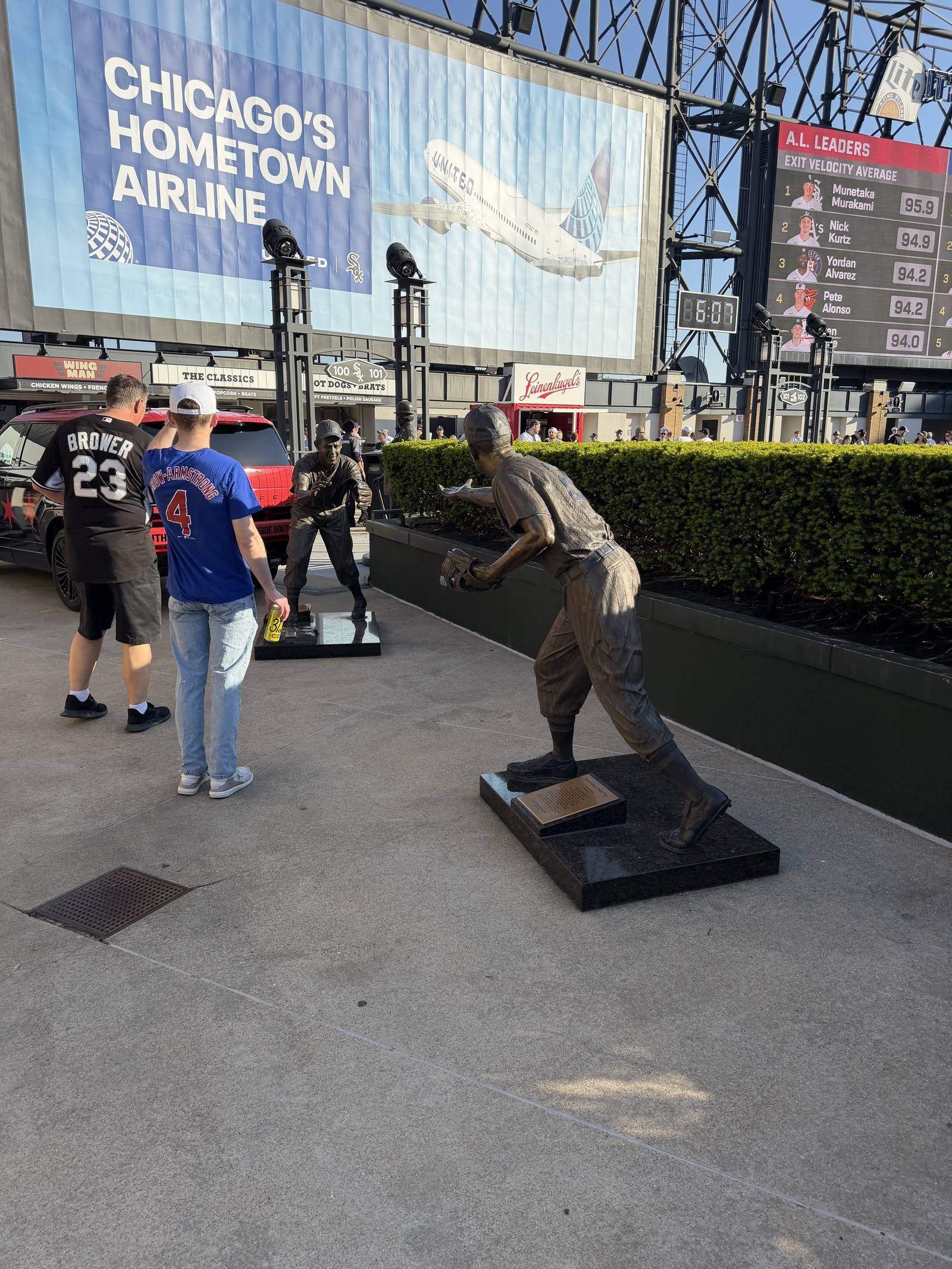 Statues of White Sox legends on the Rate Field outfield concourse