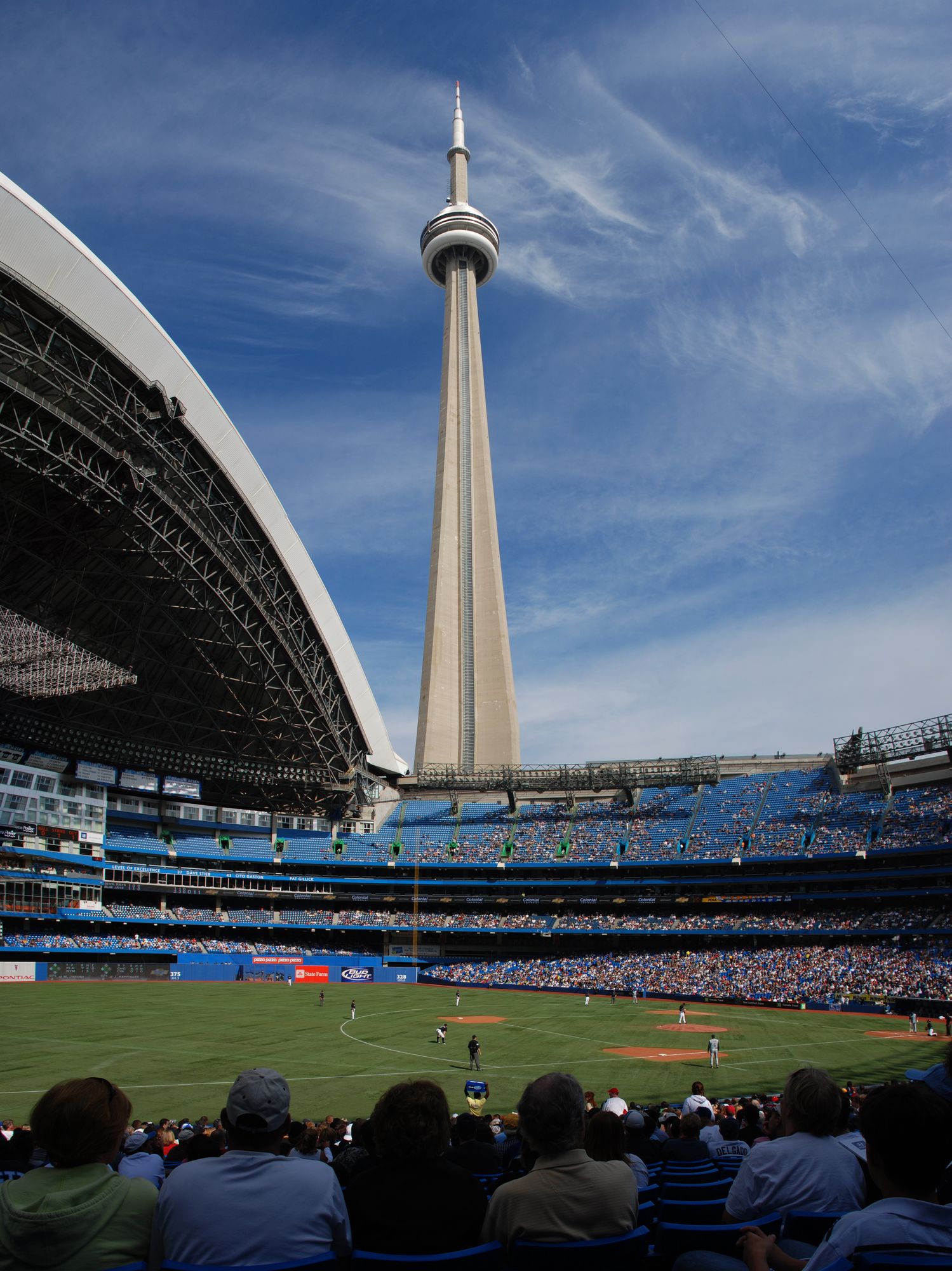 Rogers Centre with the CN Tower rising directly behind the dome