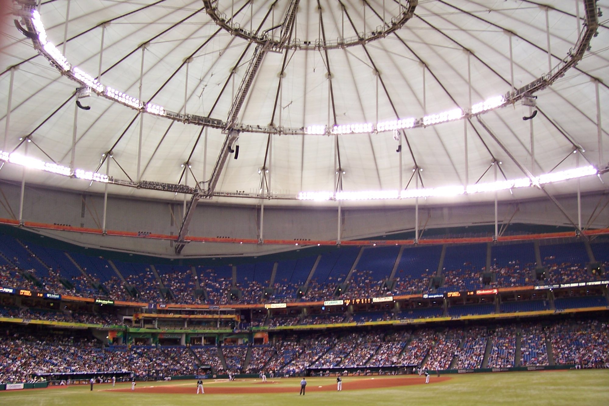 The white domed roof and catwalks above the field at Tropicana Field during a game